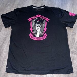 Nike Men's Black Tee with Pink Football Graphic
